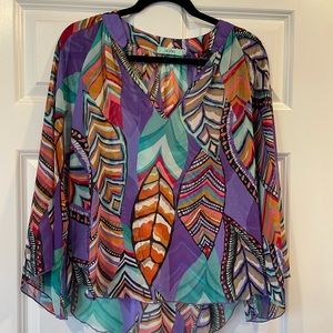 Pop of color blouse, flowy body and sleeve with notch collar detail